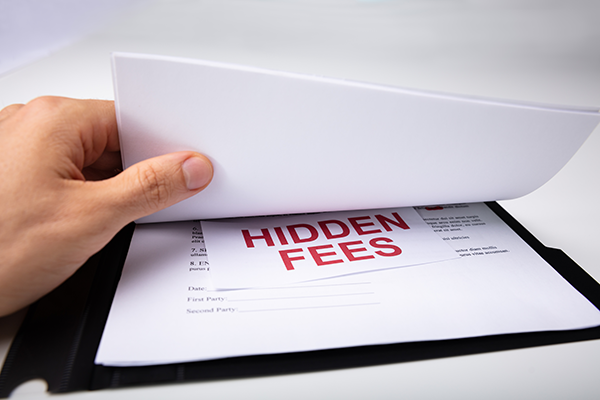 Close-up of a business contract showing hidden fees in printer agreements